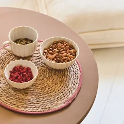 Set de table tressé en jonc de mer liseré terracotta d38cm